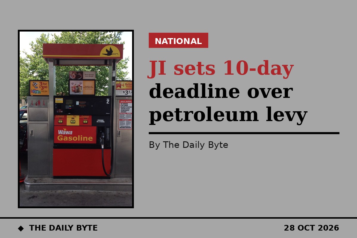 Generic photograph of a petrol station forecourt with fuel pumps (generic image, not a Pakistan station or the JI press conference)